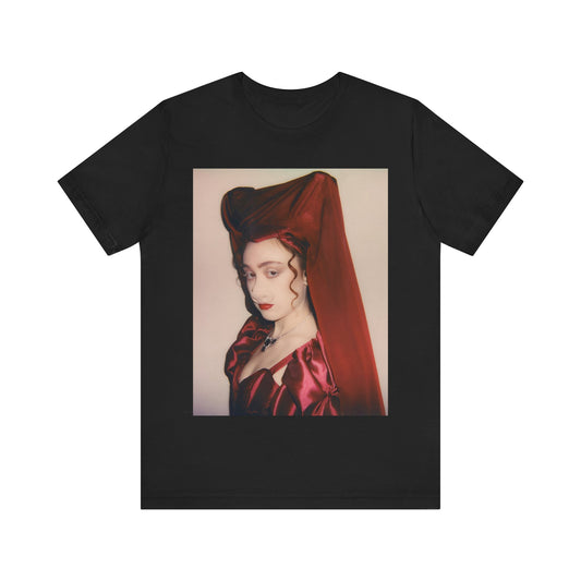 A black graphic t-shirt featuring a vintage-style graphic of Chappell Roan as a pop star.