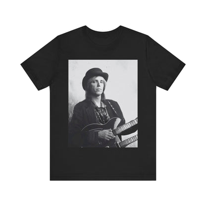 A black graphic t-shirt featuring a graphic related to Tom Petty's 'Wildflowers' album era.