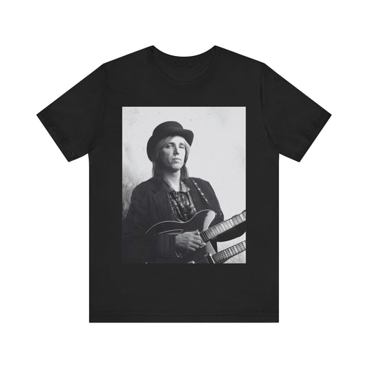 A black graphic t-shirt featuring a graphic related to Tom Petty's 'Wildflowers' album era.