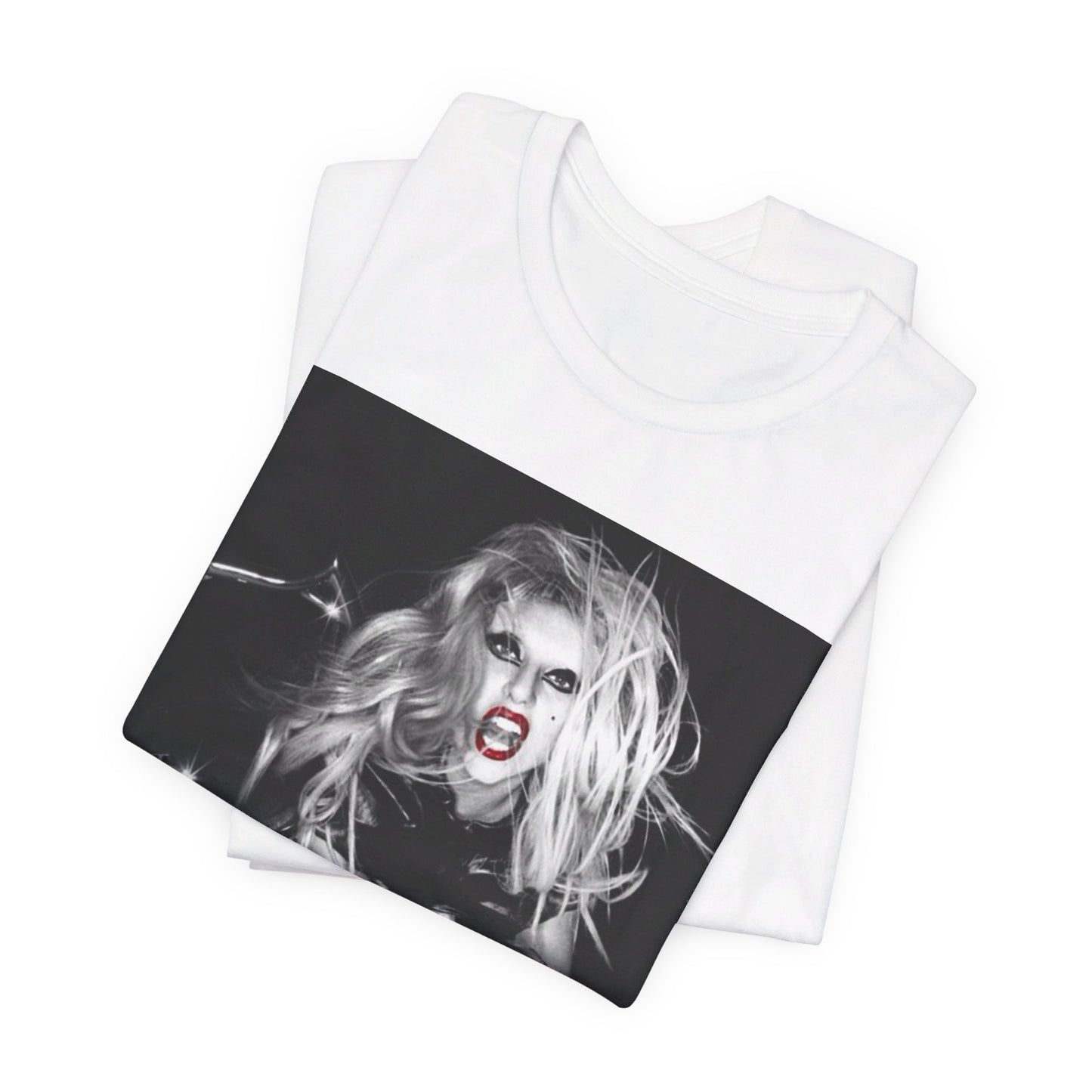 A black graphic t-shirt featuring a vintage black and white pop icon graphic of Lady Gaga.