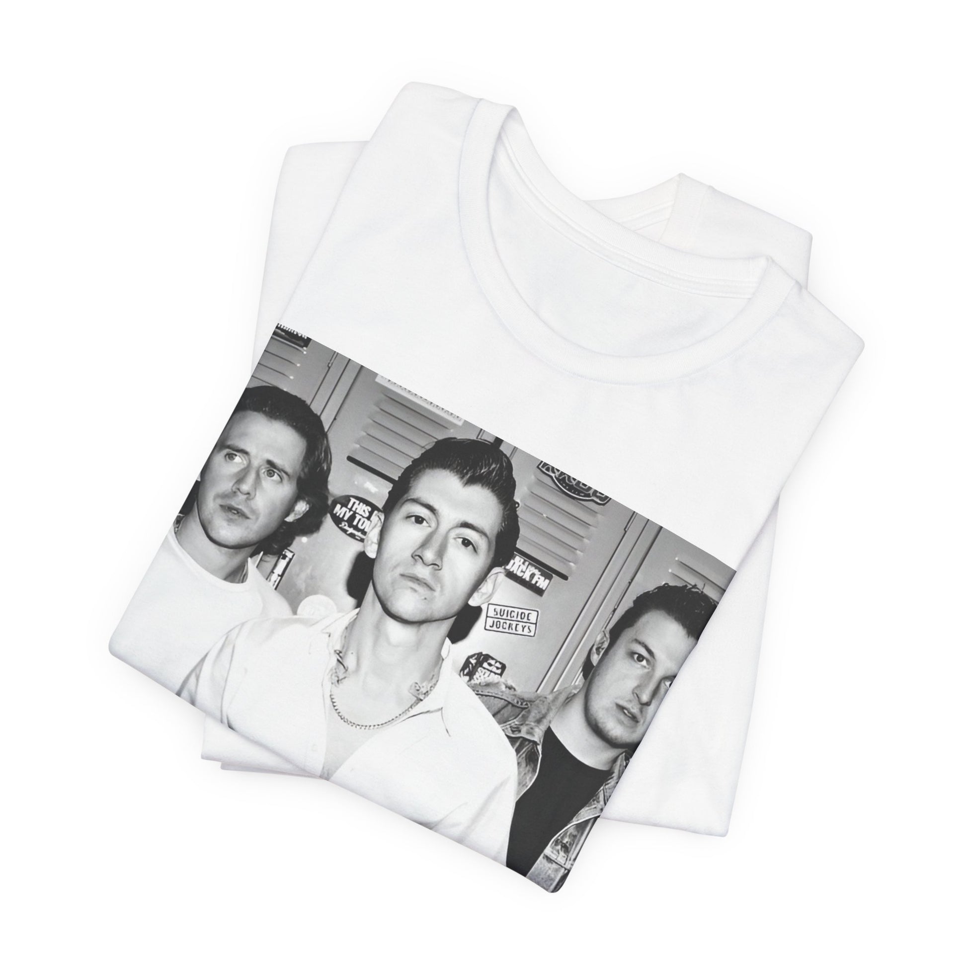 A black graphic t-shirt featuring a vintage-style design related to Arctic Monkeys' 'AM' album era, possibly with the album art or band imagery.