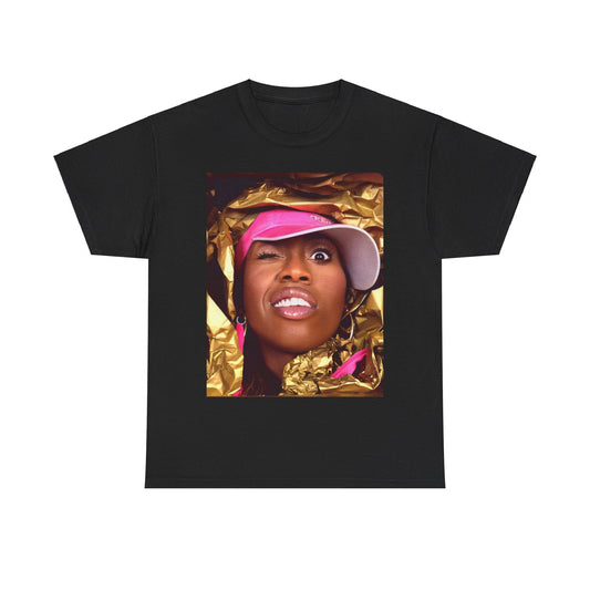 A black graphic t-shirt featuring a graphic related to Missy Elliott's 90s rap music video visionary style.