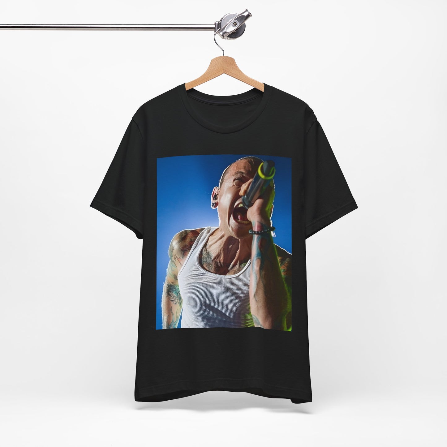 A black graphic t-shirt featuring a retro graphic of Linkin Park performing live.