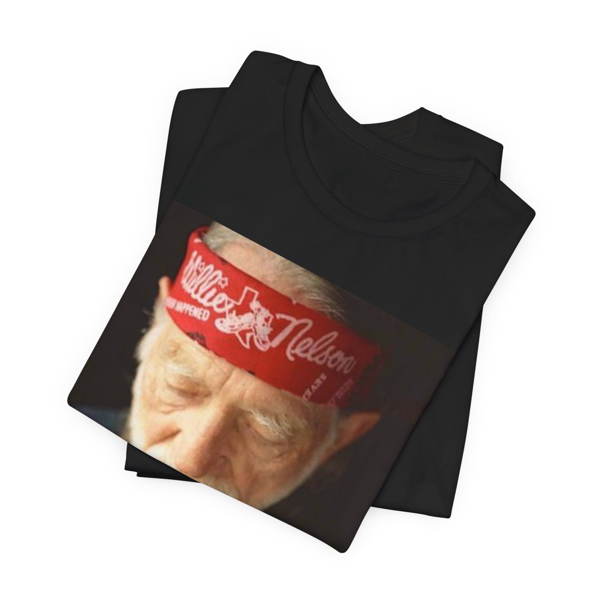 A black graphic t-shirt featuring a Texas music aesthetic graphic of Willie Nelson.
