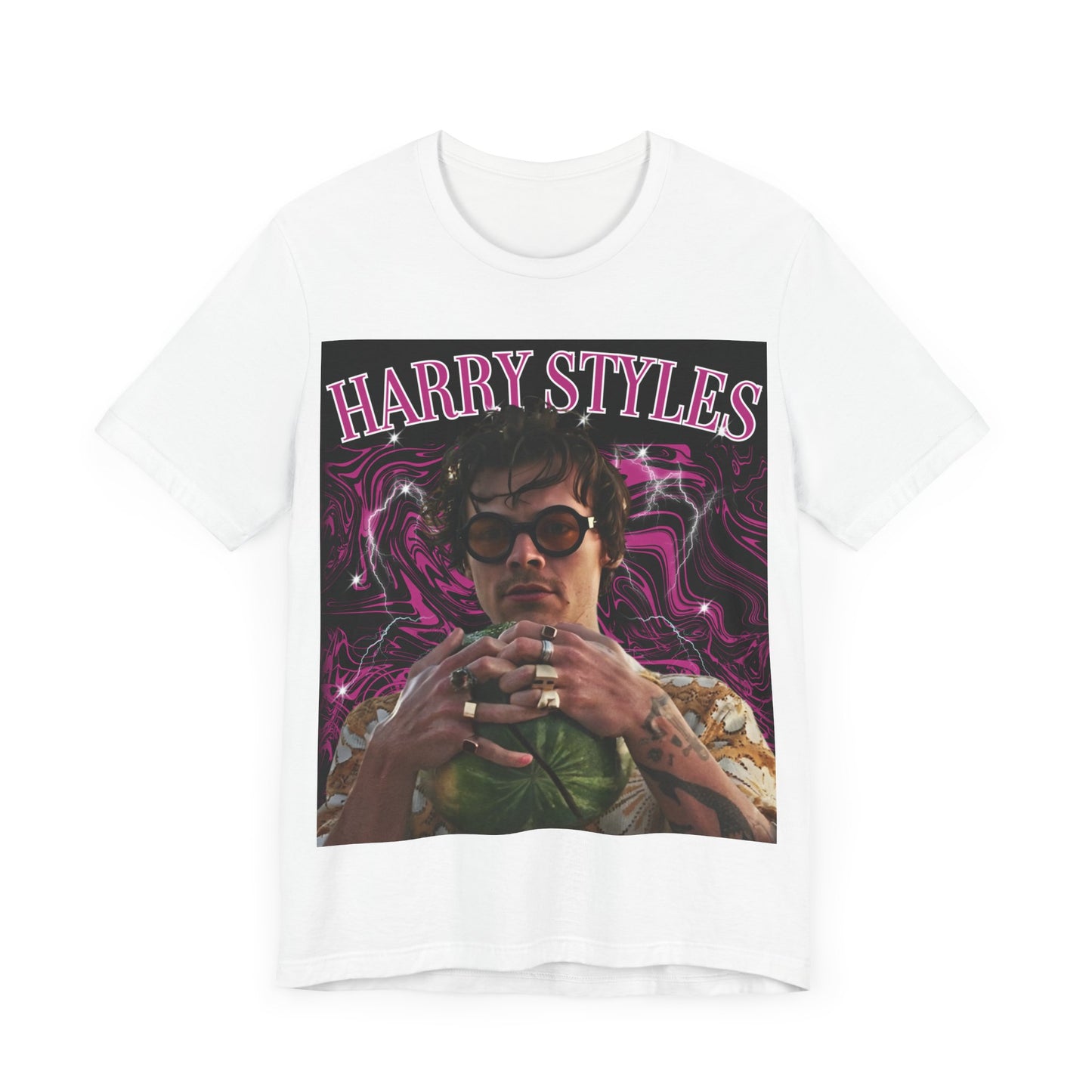 A black graphic t-shirt featuring a bootleg-style pop graphic of Harry Styles.