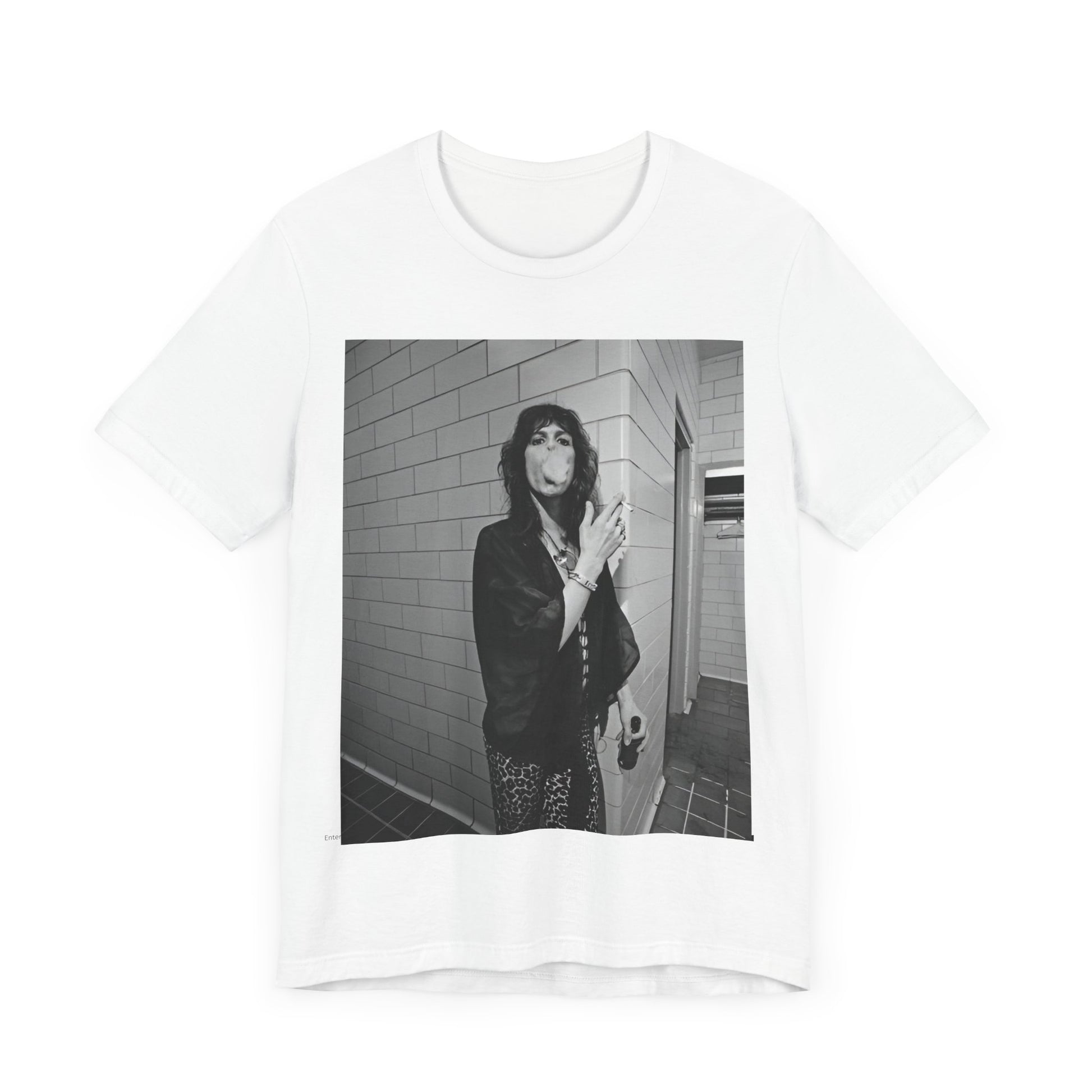 A black graphic t-shirt featuring a retro 70s photo of Aerosmith band members in a backstage setting, showing a candid moment.
