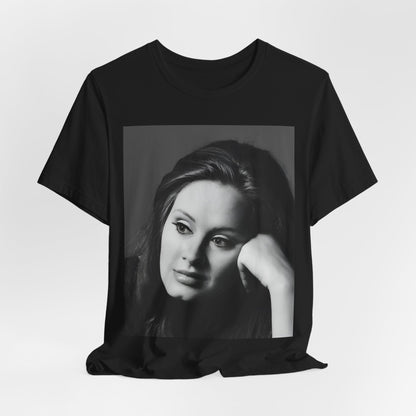 A black graphic t-shirt featuring a vintage-style black and white studio portrait of Adele, showing her with a poised and elegant expression.