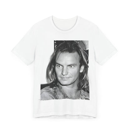 A black graphic t-shirt featuring a retro graphic related to Sting's 'Synchronicity' album era.
