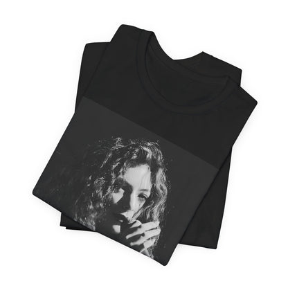 A black graphic t-shirt featuring a graphic or photo of Lorde performing live.