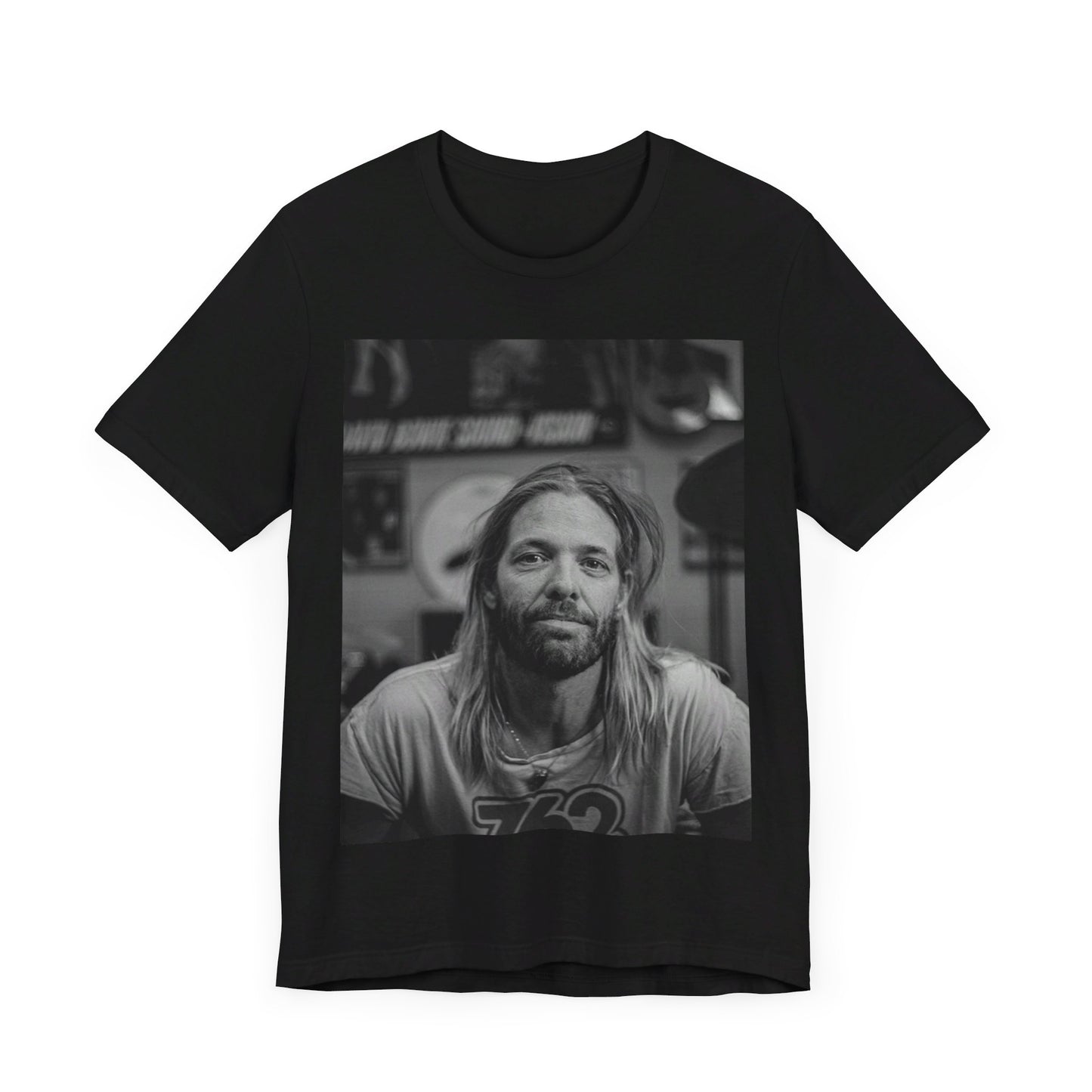 A black graphic t-shirt featuring a tribute graphic for Taylor Hawkins of Foo Fighters.