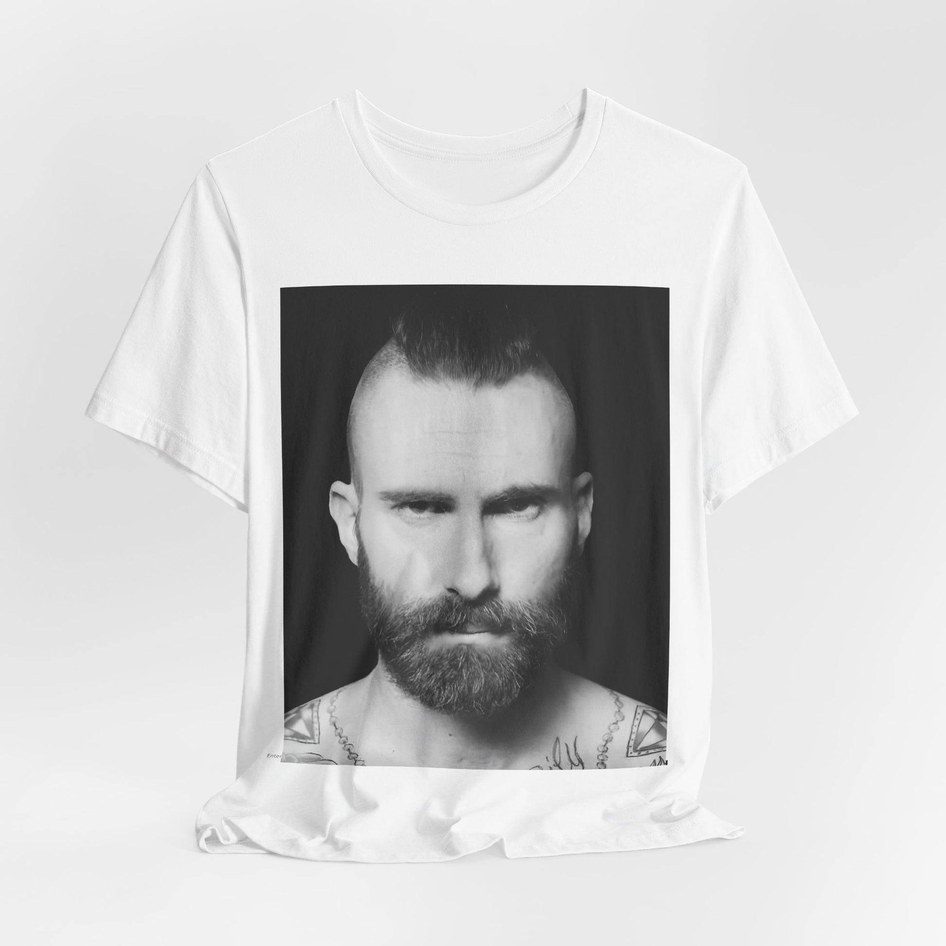 A sharp, polished studio portrait of Maroon 5 frontman Adam Levine, printed on a graphic t-shirt.
