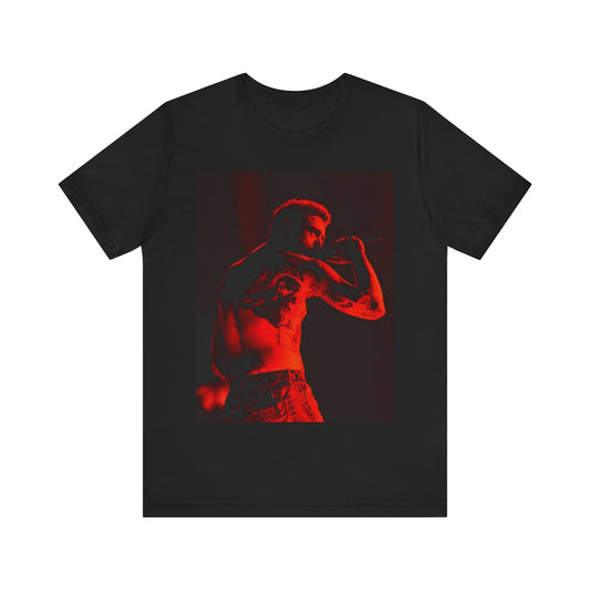 A black graphic t-shirt featuring a graphic related to Post Malone's 'Stoney' album or live performances.