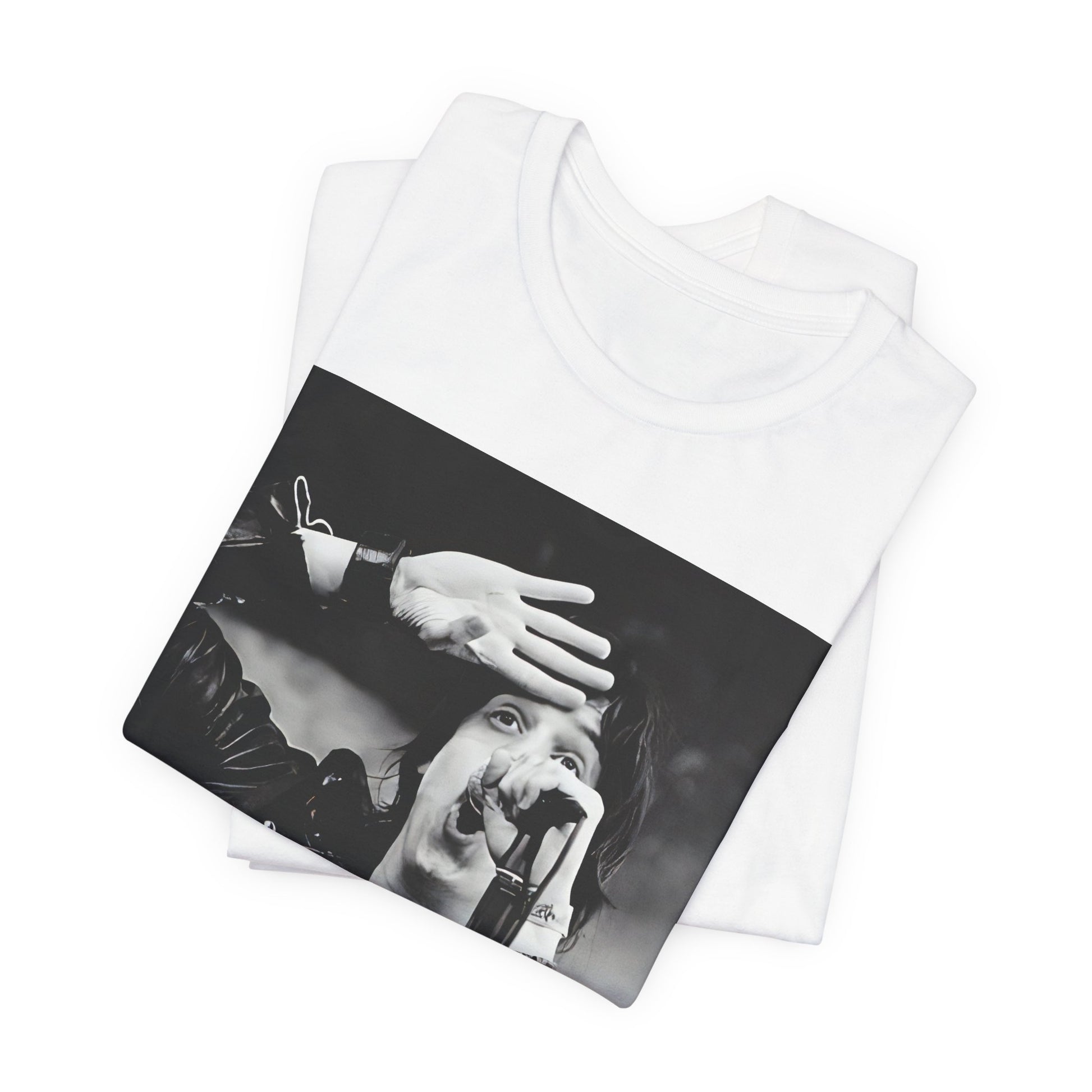 A black graphic t-shirt featuring a black and white portrait photo of The Strokes band.