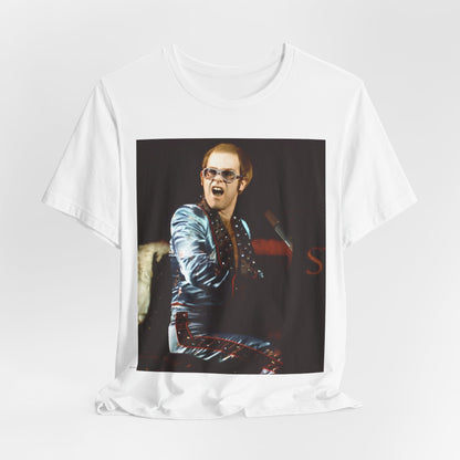A black graphic t-shirt featuring a retro graphic related to Elton John's 'Rocket Man' song or era.