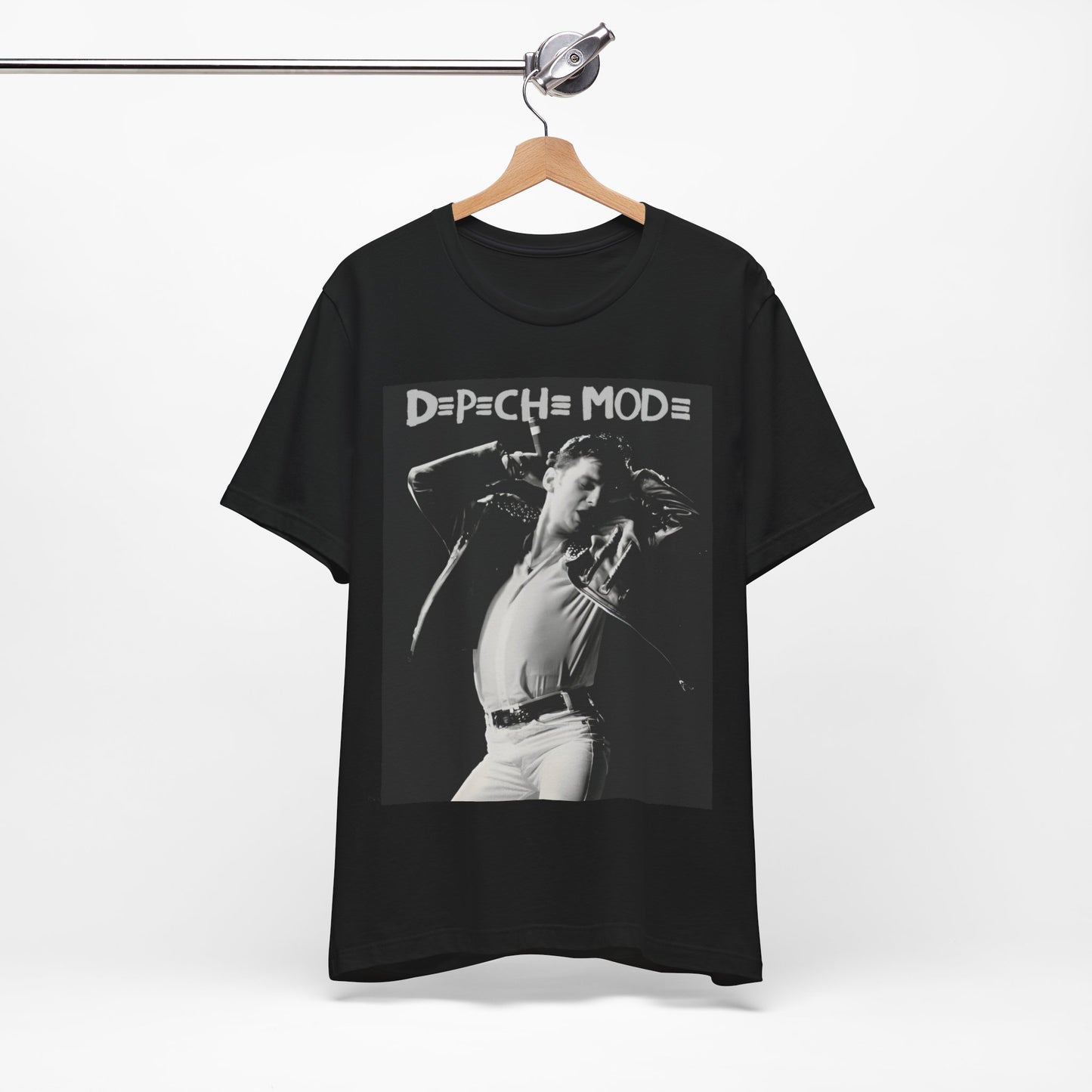 A black graphic t-shirt featuring a black and white graphic or photo of Depeche Mode performing live on stage.