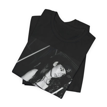 A black graphic t-shirt featuring a black and white, monochrome graphic or portrait of Dua Lipa.
