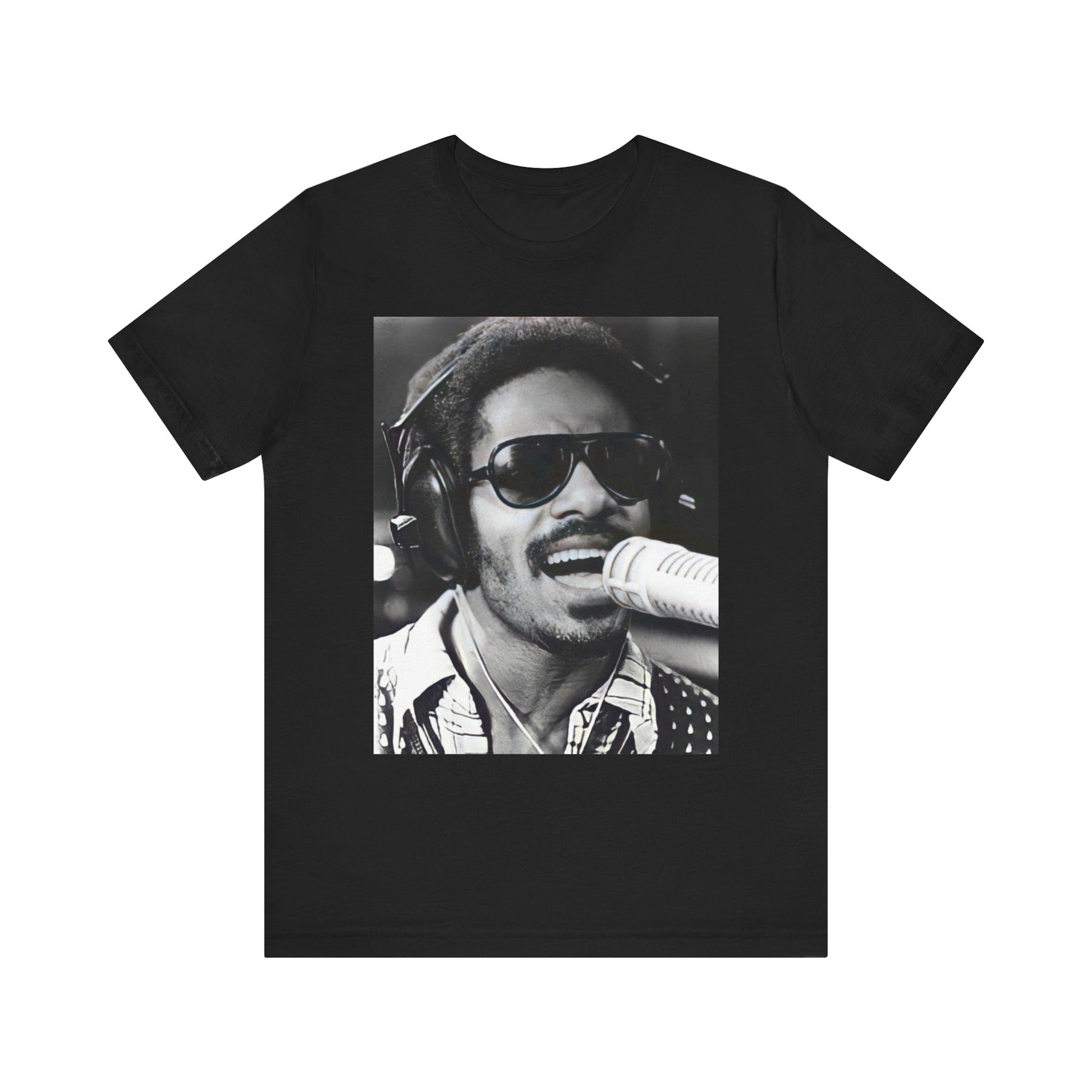 A black graphic t-shirt featuring a graphic of Stevie Wonder as a timeless visionary.