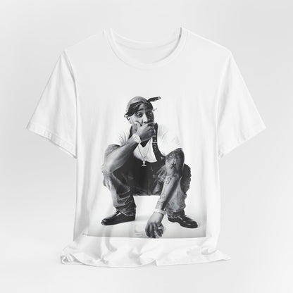A black graphic t-shirt featuring a graphic of Tupac with a conscious rap vibe.
