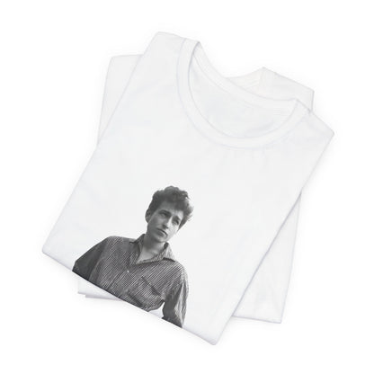 A black graphic t-shirt featuring a vintage 60s folk aesthetic graphic of Bob Dylan.