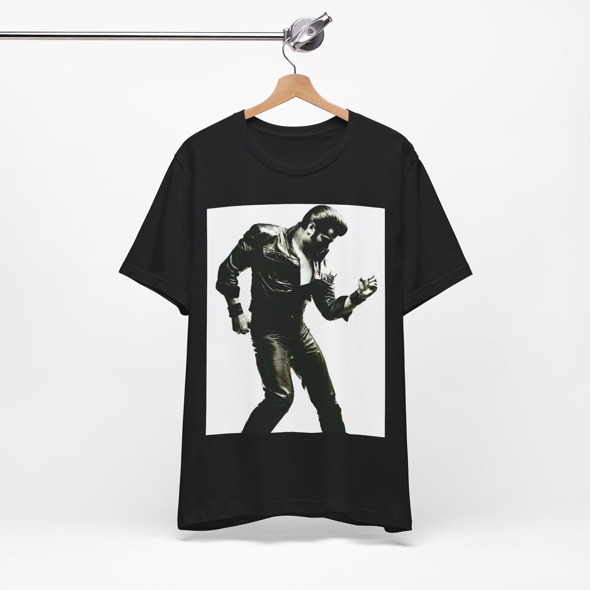A black graphic t-shirt featuring a retro black and white monochrome photo or graphic of Elvis Presley.