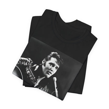 A black graphic t-shirt featuring a graphic related to Elvis Presley's 'Burning Love' song or era.