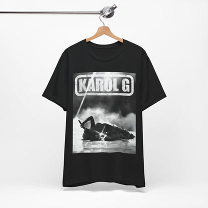 A black graphic t-shirt featuring a black and white graphic or photo of Karol G performing live on stage.