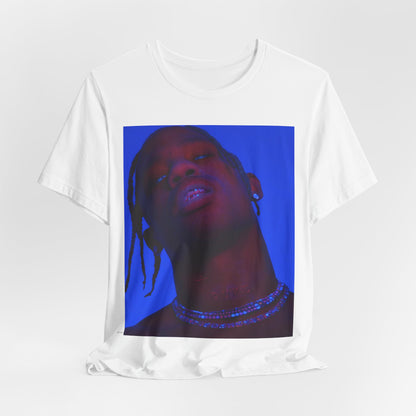 A black graphic t-shirt featuring a bold graphic of Travis Scott as a rap superstar.