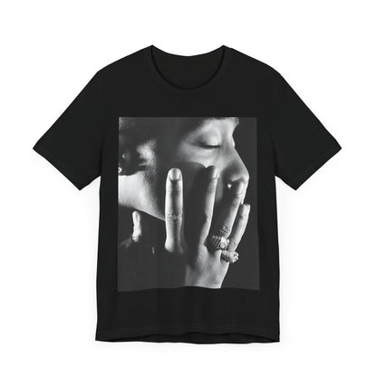 A black graphic t-shirt featuring an iconic West Coast swag graphic of Tupac.