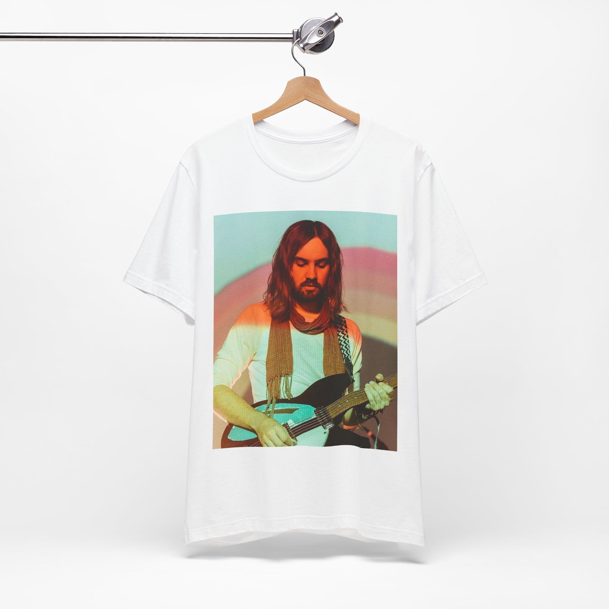 A black graphic t-shirt featuring a dream rock aesthetic graphic of Tame Impala.