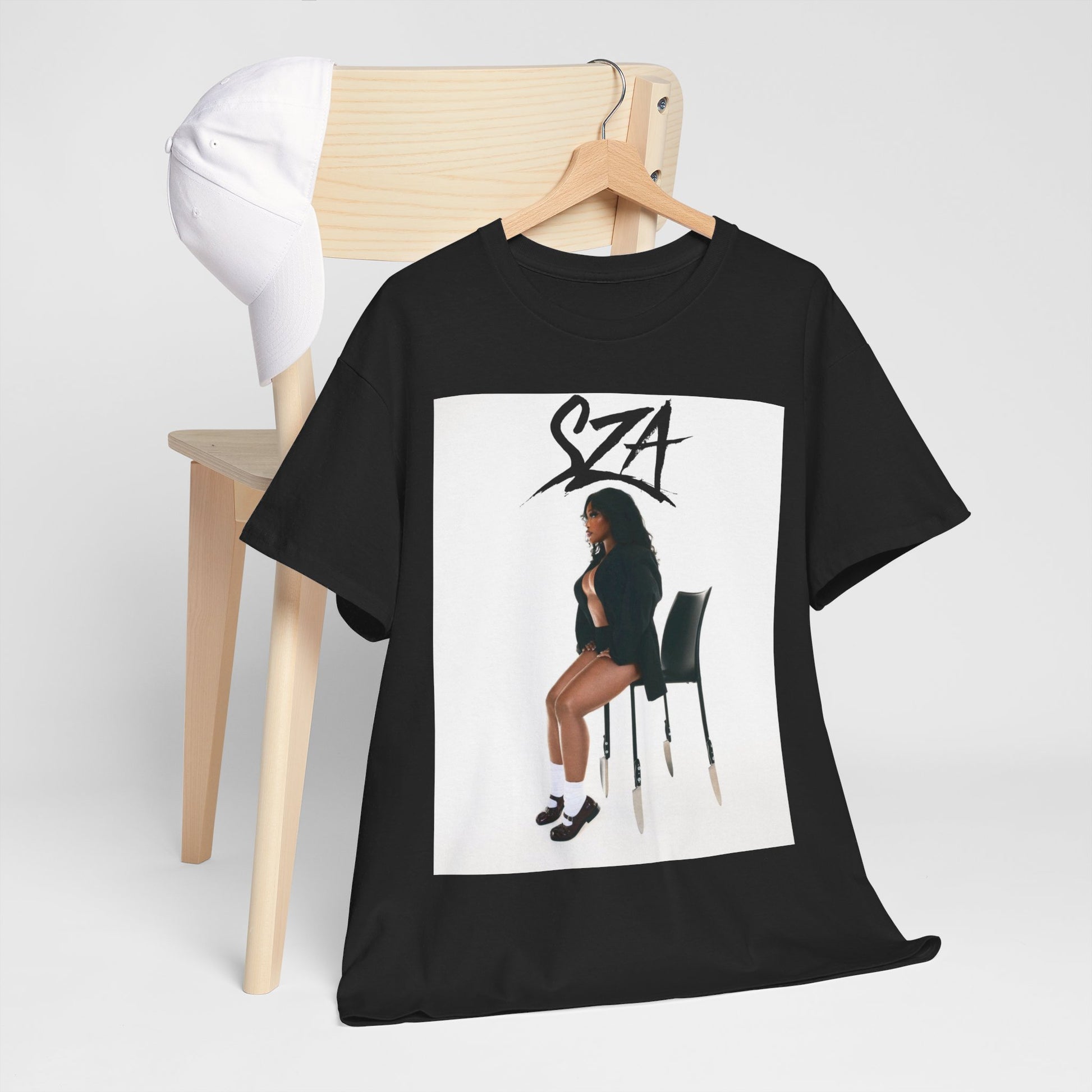 A black graphic t-shirt featuring a chill neo-soul aesthetic graphic of SZA.