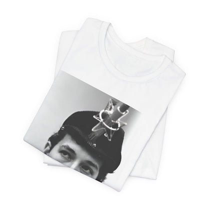 A black graphic t-shirt featuring a graphic of Bob Dylan in an acoustic session setting, possibly with his guitar.