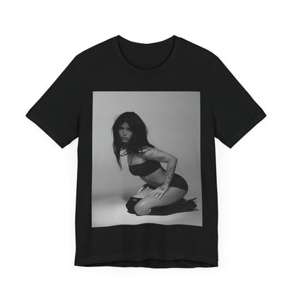 A black graphic t-shirt featuring a black and white, monochrome graphic or photo of Nessa Barrett.