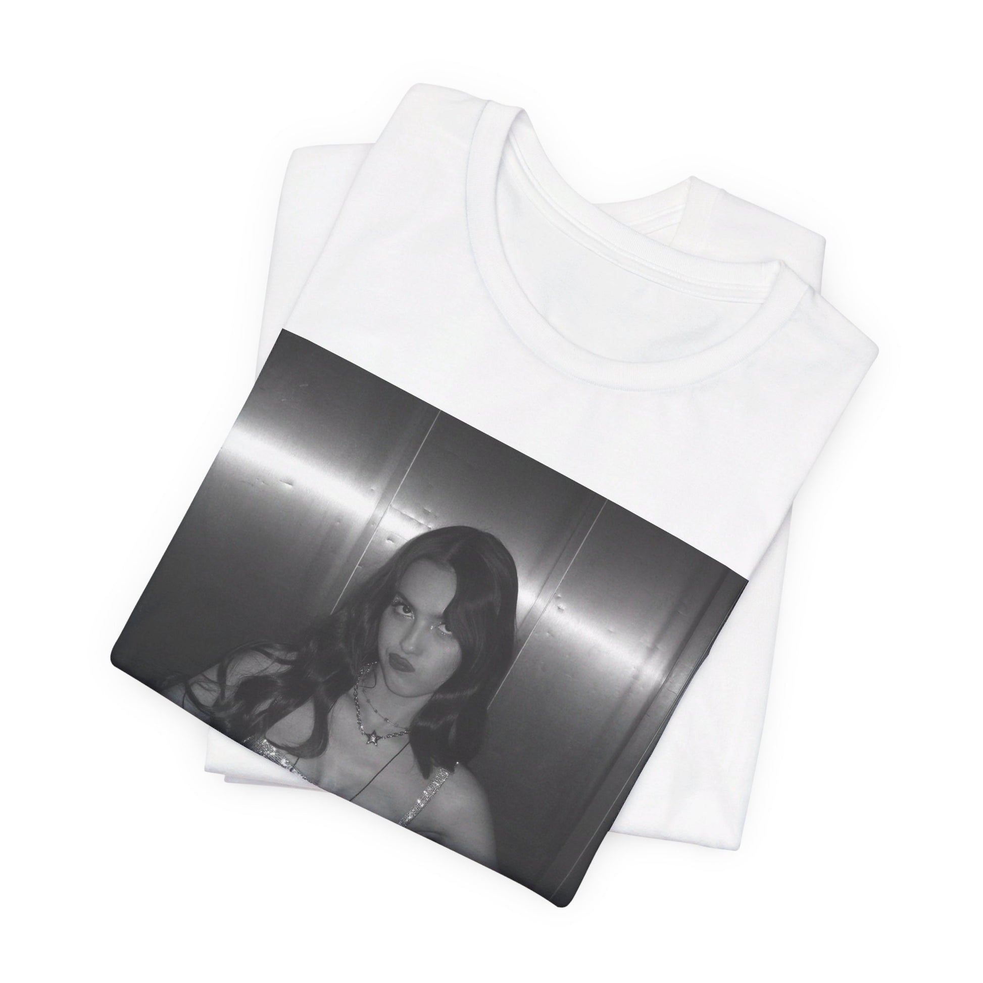 A black graphic t-shirt featuring a black and white portrait photo of Olivia Rodrigo.