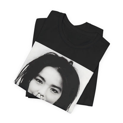 A black graphic t-shirt featuring a 90s black and white photographic portrait of Bjork.