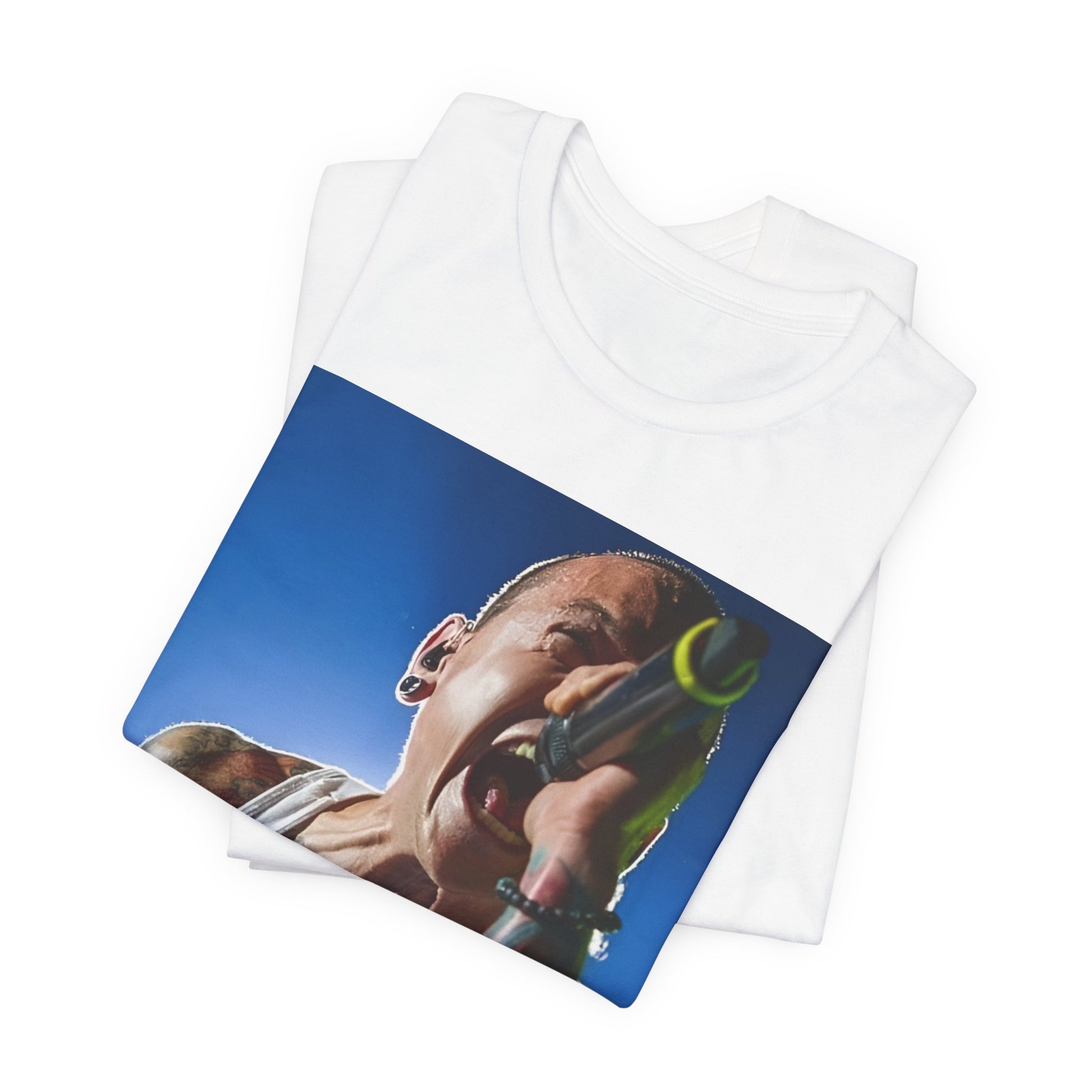 A black graphic t-shirt featuring a retro graphic of Linkin Park performing live.