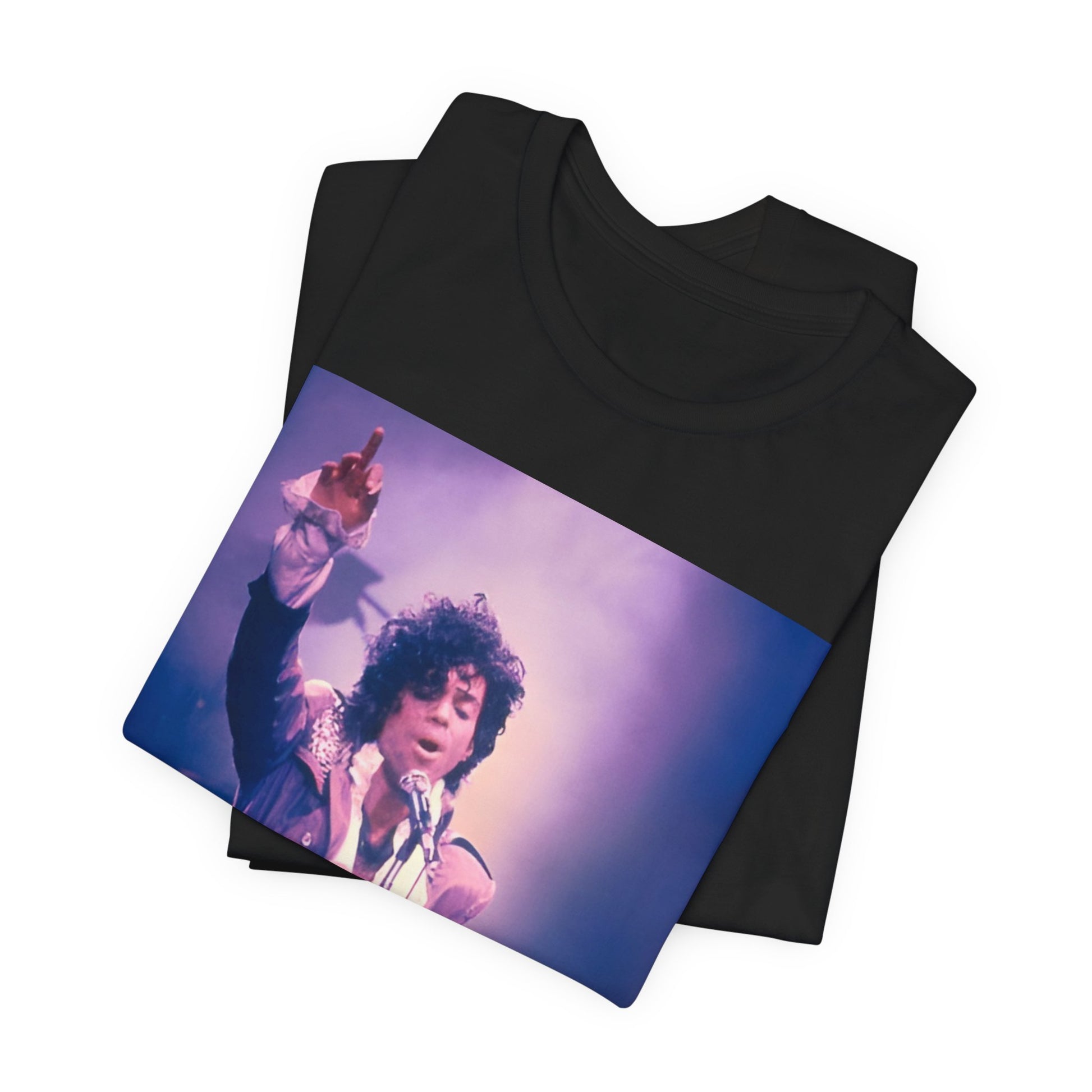 A black graphic t-shirt featuring a boxy graphic with a 'Purple Rain' vibe related to Prince.