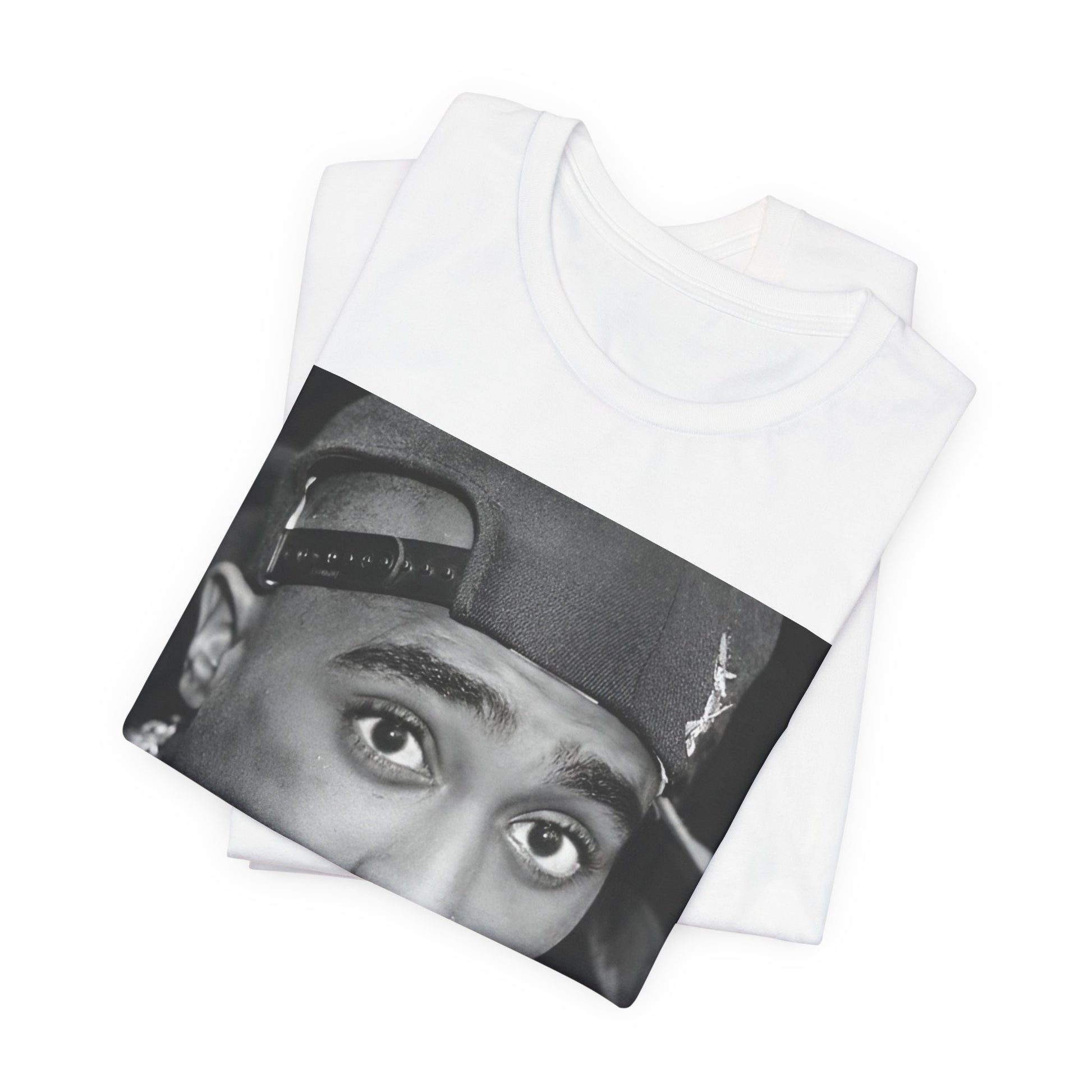 A black graphic t-shirt featuring a bold graphic of Tupac as a rap superstar.