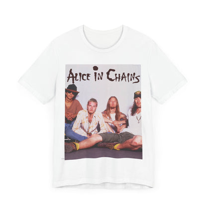 A black graphic t-shirt featuring a classic rock graphic of Alice In Chains from the 1990s, possibly with band members or stylized logo.