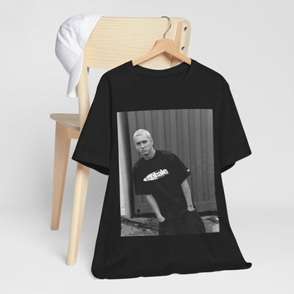 A black graphic t-shirt featuring a graphic of Eminem with a Detroit hip hop aesthetic.