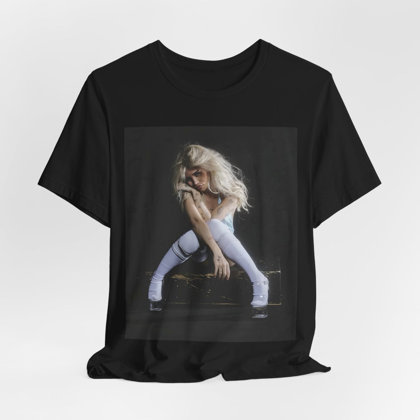 A black graphic t-shirt featuring a graphic of Nessa Barrett with dark pop vibes aesthetic.