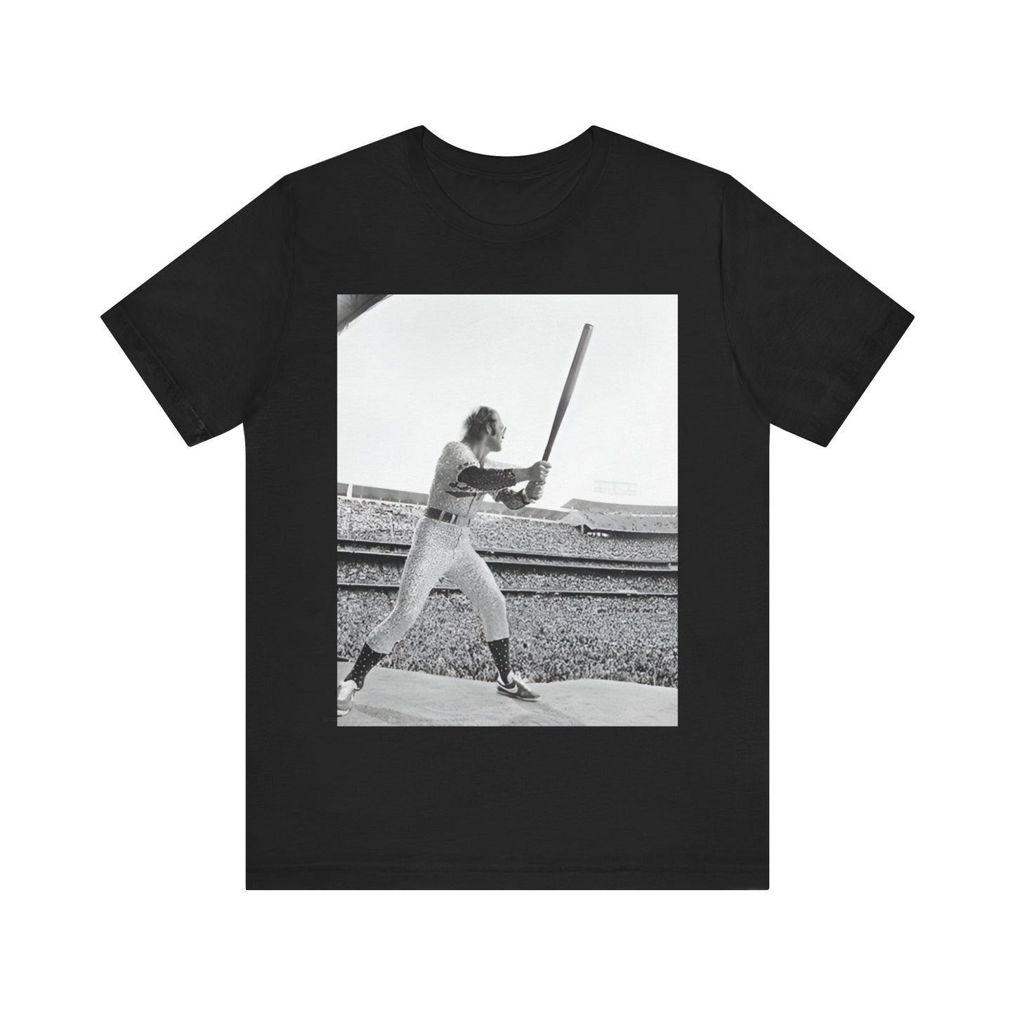 A black graphic t-shirt featuring a black and white graphic or photo related to Elton John's 1975 tour in America.