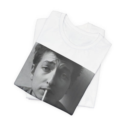 A black graphic t-shirt featuring a graphic of Bob Dylan from the 60s, depicted as a renegade folk icon.