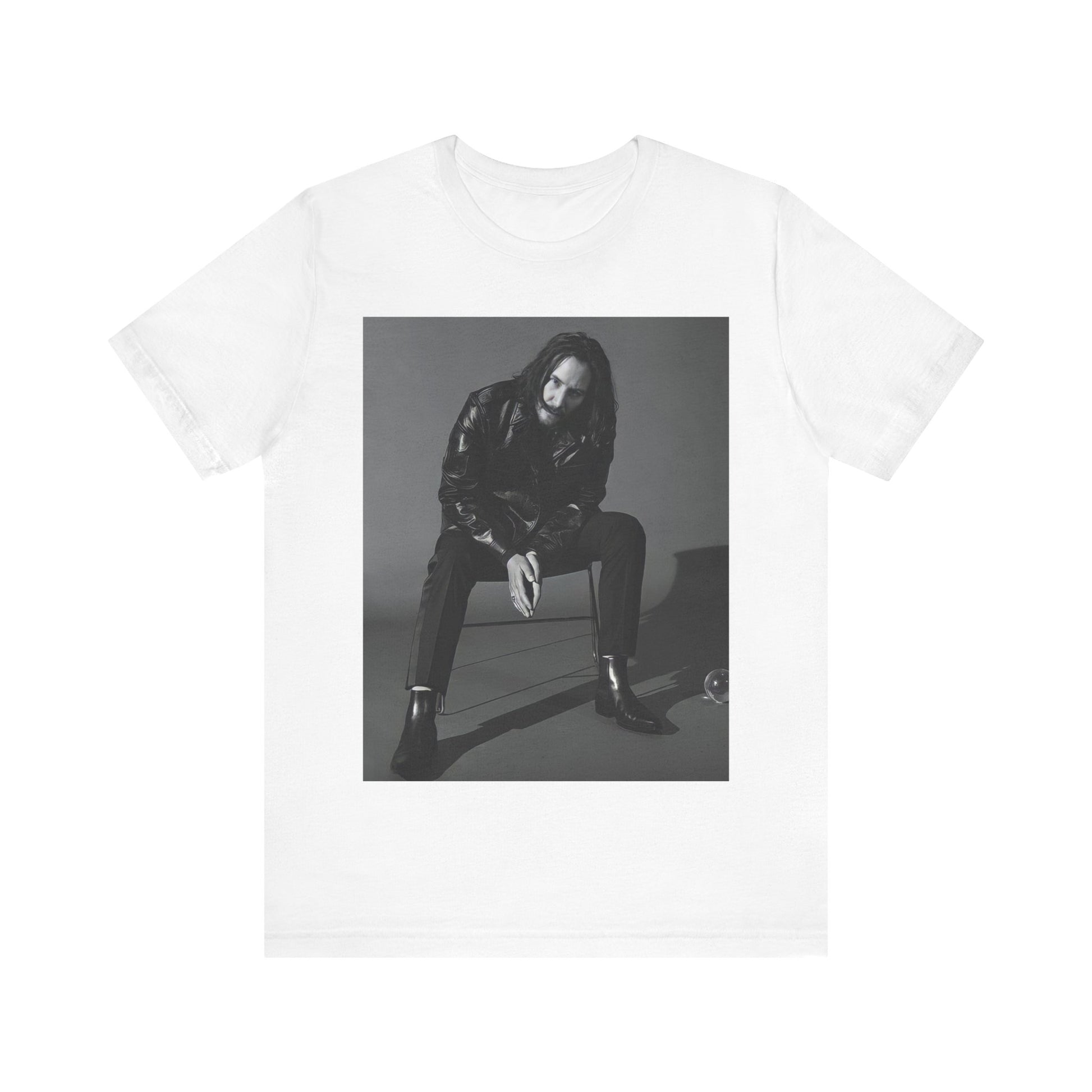 A black graphic t-shirt featuring a graphic of Keanu Reeves as John Wick.