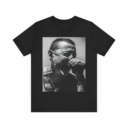 A black graphic t-shirt featuring a fierce graphic of Linkin Park performing live on stage.