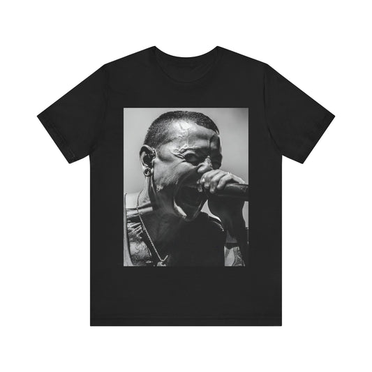 A black graphic t-shirt featuring a fierce graphic of Linkin Park performing live on stage.