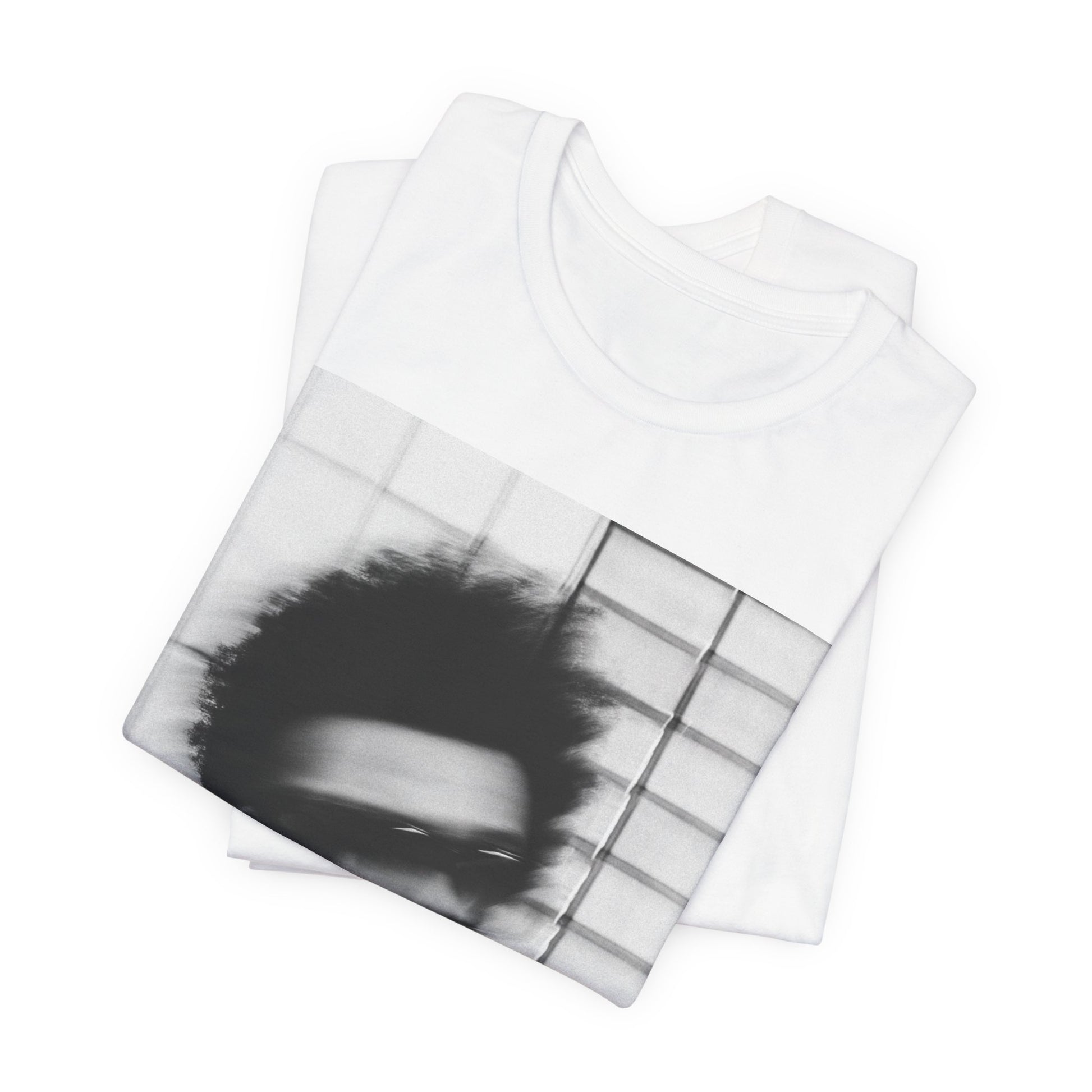A black graphic t-shirt featuring a blurred graphic of The Weeknd from his 'After Hours' era.
