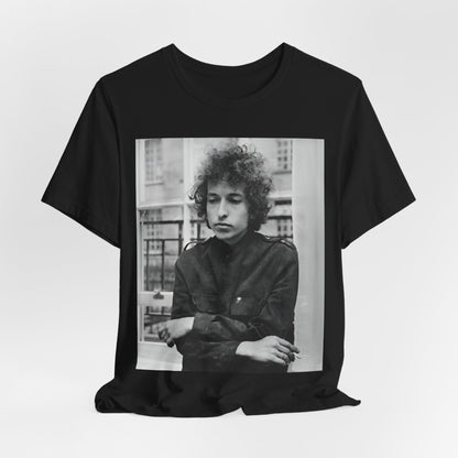 A black graphic t-shirt featuring a black and white graphic of Bob Dylan from the folk revival era.