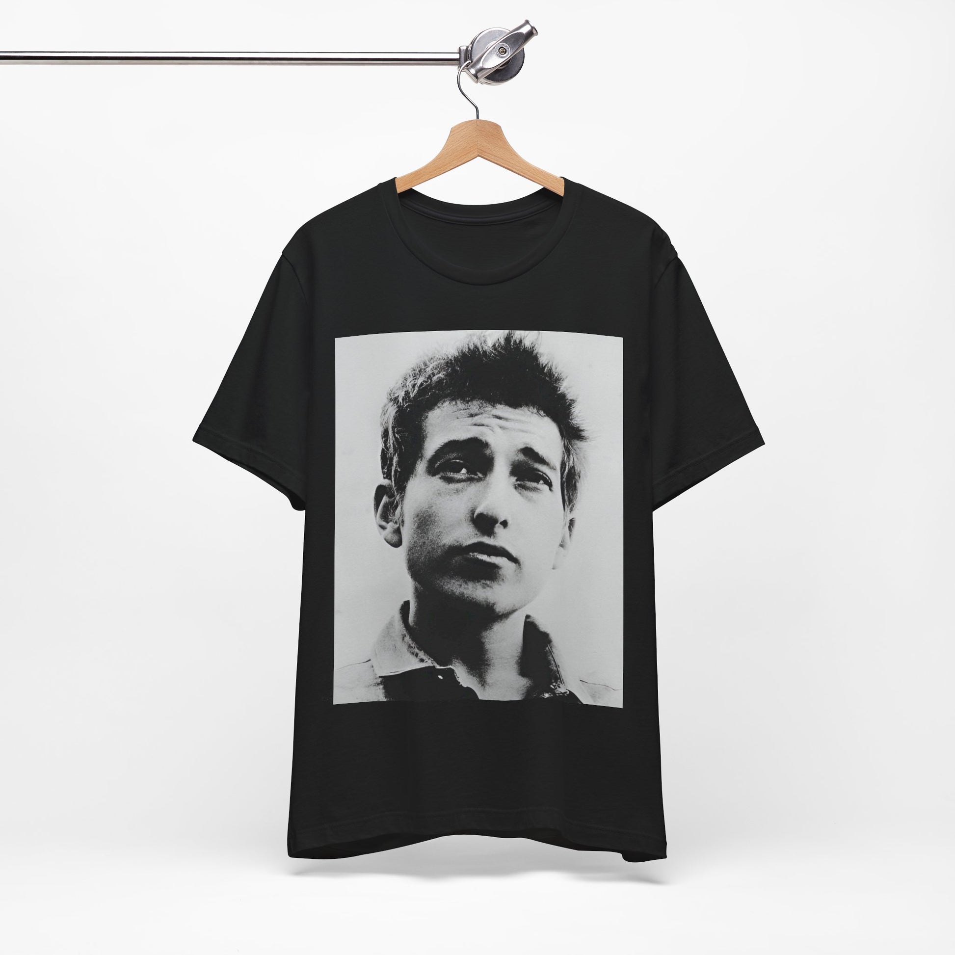 A black graphic t-shirt featuring a retro black and white folk iconic graphic of Bob Dylan.