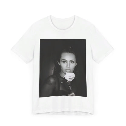 A black graphic t-shirt featuring a graphic related to Miley Cyrus' 'Flowers' song or era.