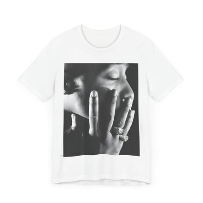 A black graphic t-shirt featuring an iconic West Coast swag graphic of Tupac.